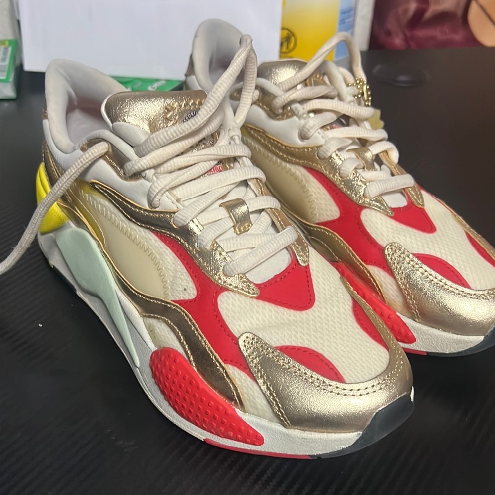Puma Gold and Red Sneakers